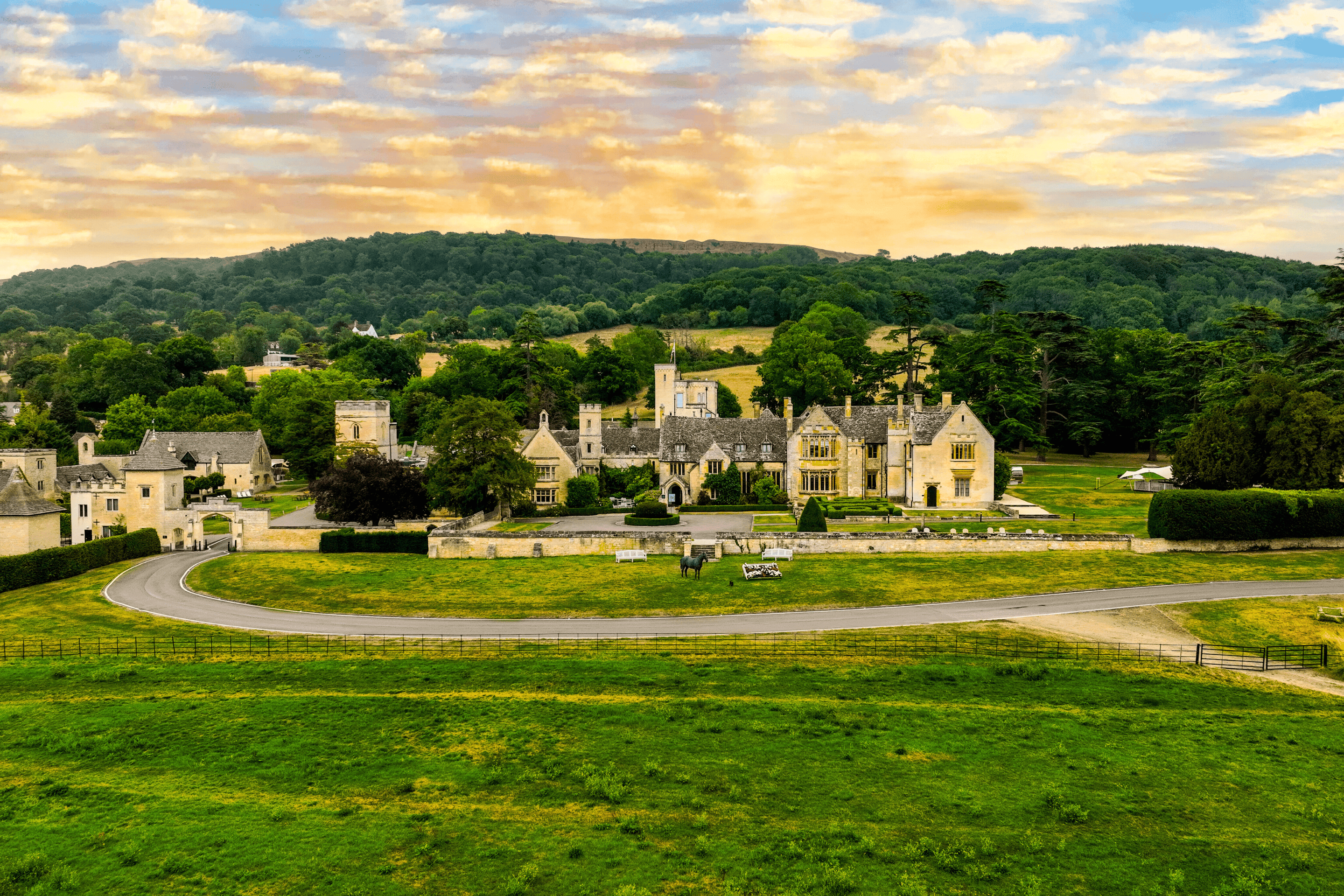 Aerial view of Ellenborough Park Hotel's Cotswold stone manor house and sweeping grounds