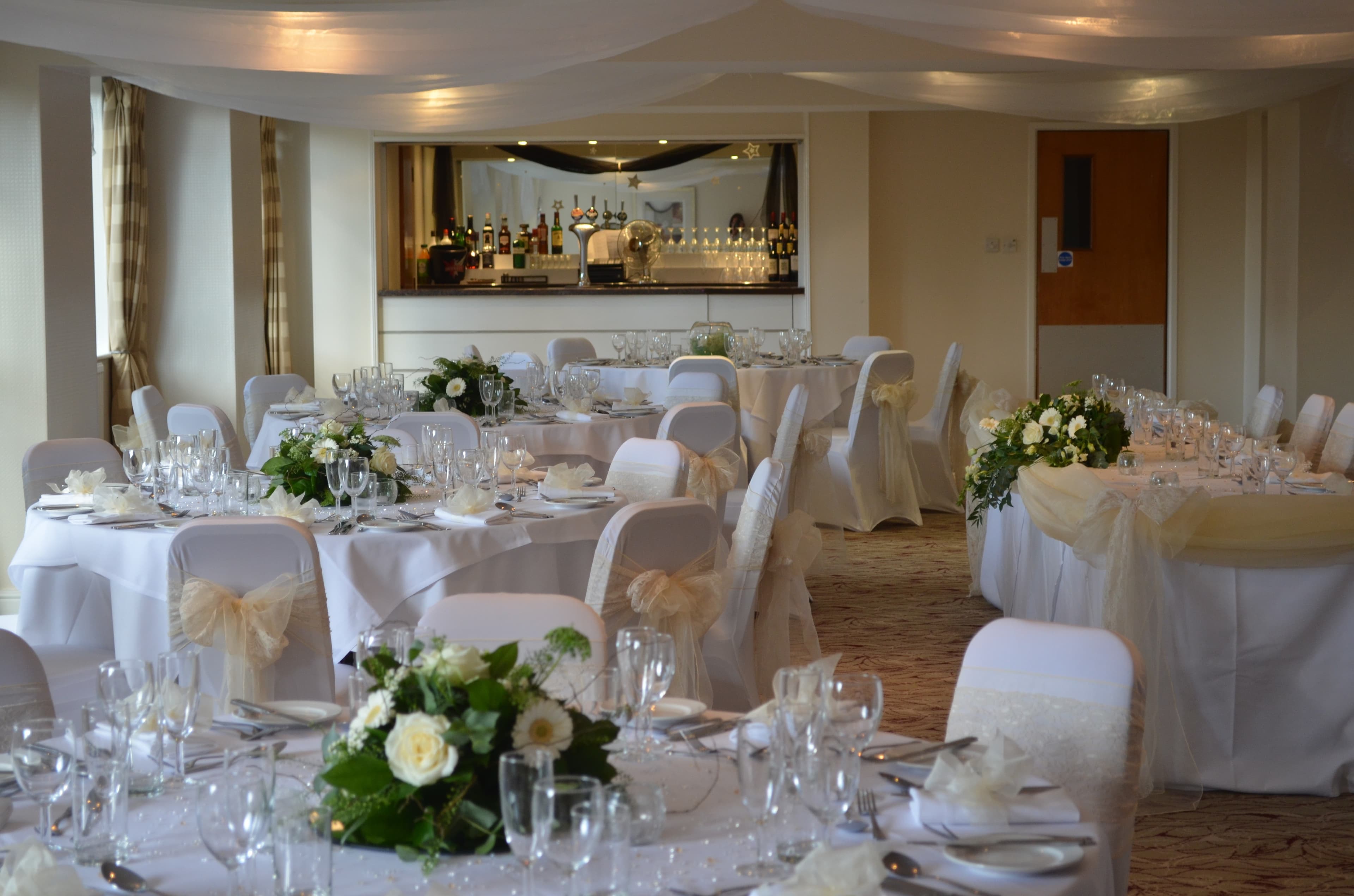Cambridge Suite yellow floral centrepieces