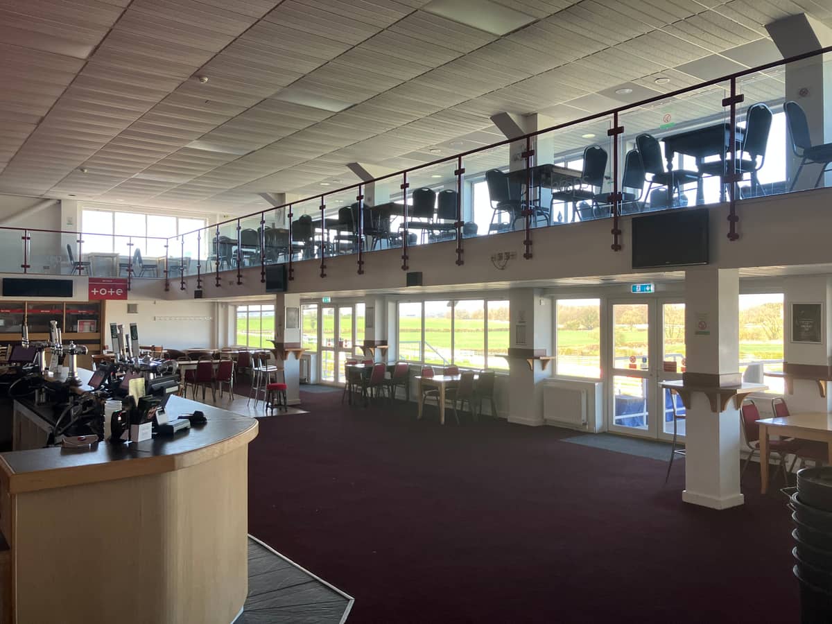 Interior bar area and mezzanine level overlooking the racecourse at Sedgefield Racecourse.